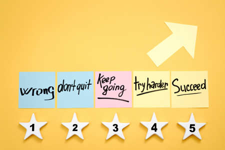 Developing strategy. Business growth and success. Objectives and steps to take. Motivation memo notes, stars and arrow.の写真素材