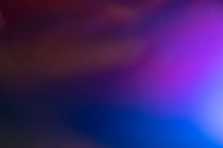 Blurred purple and blue color gradient. Glowing abstract background. Lens flare effect.の写真素材