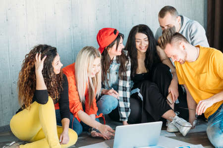 Working together toward common goal. Successful business team analyzing data. Strategy to increase sales and revenues.の写真素材