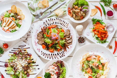 Top view of food meals selection. Restaurant banquet dinner. Buffet menu.の写真素材
