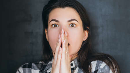 Shock panic fright. Scared young woman. Eyes bulging with fear mouth open. Negative emotion facial...
