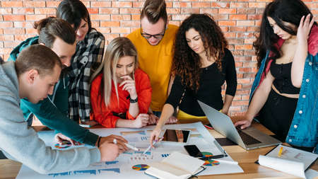 Business team meeting. Project strategy analysis. Millennials discussing marketing plan. Creative...