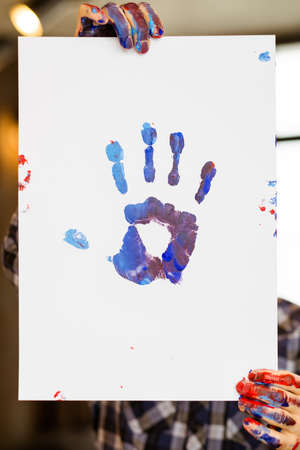 Art school. Creative hobby and leisure. Talent and inspiration. Fun and easy techniques to improve painting skills. Hand print on paperの写真素材