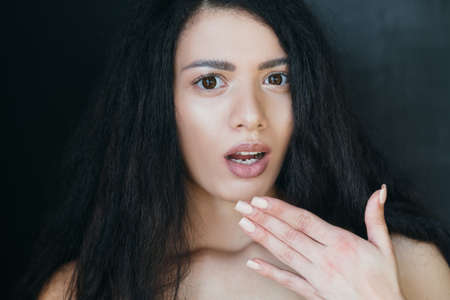 Stunned young woman portrait. Shock in eyes. Open mouth. Breaking news. Omg facial expression. Dumb...