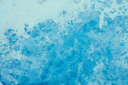Abstract art texture background. Clouds design. Beautiful sky blue painting with glitter.の写真素材