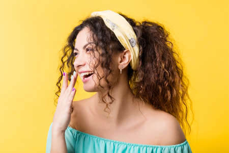 Happy young woman portrait. Pretty boho female laughing amused delighted. Positive emotion feeling facial expression.の写真素材