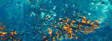 Abstract art texture background. Islands in ocean aerial view. Beautiful teal blue and orange paint...