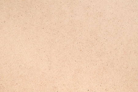 Beige plywood texture abstract art background. Solid color fiberboard surface. Empty space.の写真素材