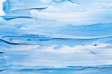 Blue and white acrylic paint art background. Brushstrokes texture. Sky abstract design.