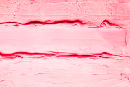 Smeared pink acrylic paint background. Raspberry ice cream effect abstract surface.