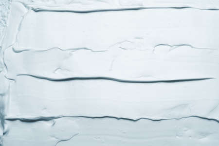 Gray foam texture abstract art background. Smeared cement paste design surface.