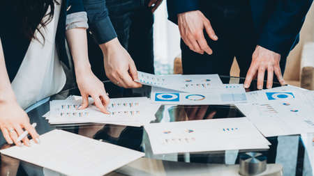 Professional team communication. Cropped shot of business partners discussing cooperation...