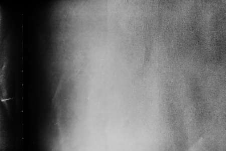 Dust scratches overlay. Aged effect. Black white old film layer for photo editor.の写真素材