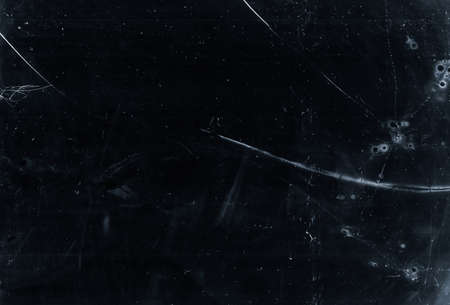 Broken glass overlay. Fractured screen texture. Dark distressed computer display with dust...