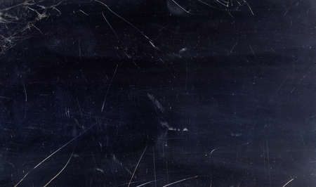 Scratched abstract background. Grunge texture. Dark distressed overlay with dust effect.