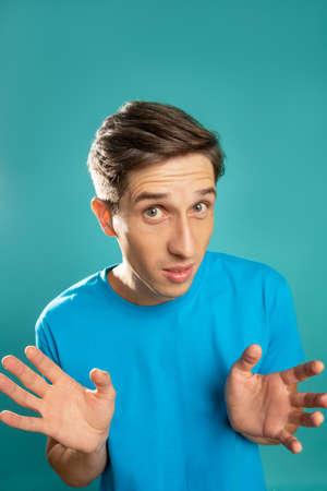 Puzzled man. Unsure emotion. Refusal gesture. You mean what. Clueless face. Surprised male actor...