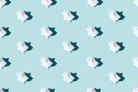 Star pattern. Blue seamless background. Abstract decor. Service feedback. White figure minimalist symmetrical composition shading isolated on light color.の写真素材