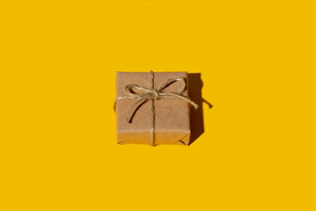 Handmade gift. Holiday surprise. Care package. Vintage parcel. Rustic beige simple eco paper box...