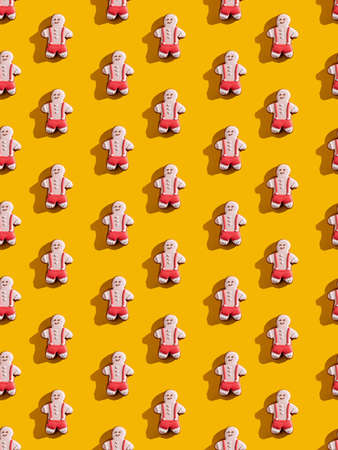 Gay pride. Orange seamless background. Lgbt tolerance. Individuality rights. Pink gingerbread man...