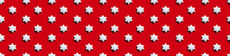 Red seamless background. White star pattern. Minimalist decor poster for children. Abstract quality symbol ornament isolated on bright.の写真素材