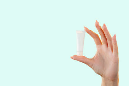 Beauty product. Skin treatment. Natural cosmetology. Minimal presentation of white mockup tube with...