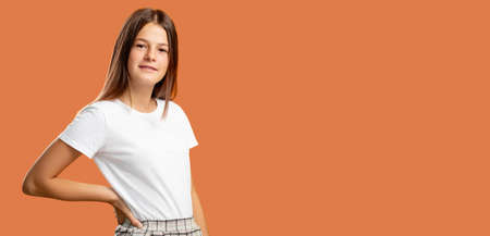 Teen lifestyle. Advertising background. Special offer. Portrait of confident cheerful happy girl...
