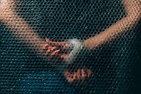 Female rights. Family abuse. Domestic violence. Freedom protection. Powerless prisoner woman tied...
