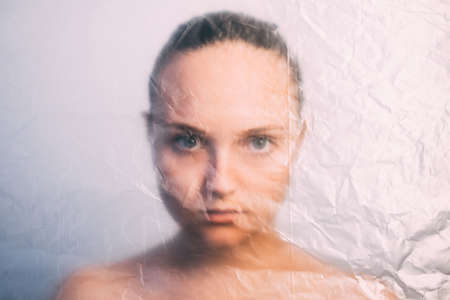 Natural beauty. Defocused woman portrait. Skin rejuvenation. Wrinkled texture closeup of female face...