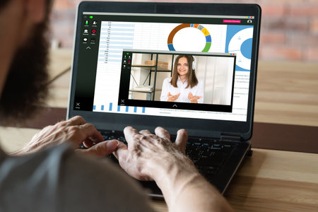 Video chat. Remote conference. Online presentation. Remote job. Man working with charts graphs...