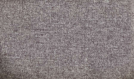 Cloth texture background. Upholstery fabric. Brown gray white soft warn woven fiber textile abstract...