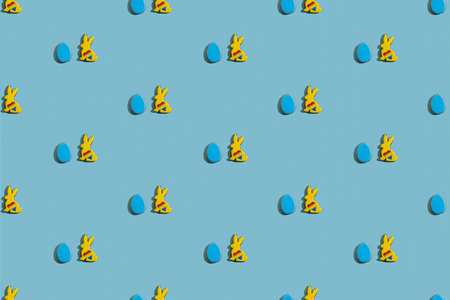 Lgbtqia background. Seamless pattern. Individuality freedom. Yellow bunny with rainbow heart blue...