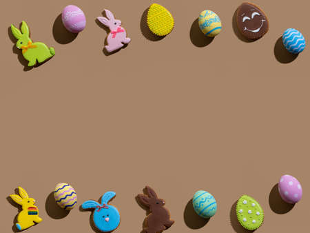 Easter banner. Holiday frame. Cute festive design. Greeting card. Colorful gingerbread biscuit...