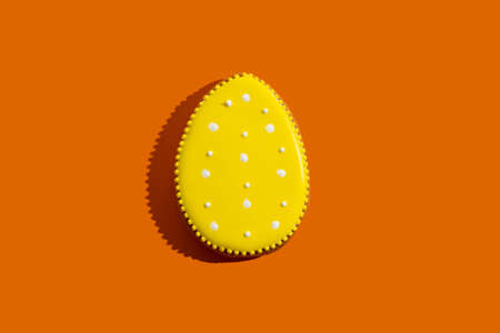 Easter bakery. Handmade cookies. Festive decoration. Spring holiday. Tasty gingerbread egg with...