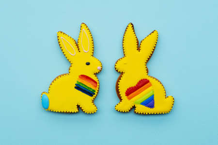 Gay pride. Lgbt ornament. Gender equality. Bakery food art. Yellow gingerbread bunny couple biscuit...
