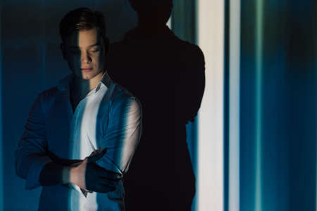 Handsome man. Fashion style. Model shooting. Success leadership. Confident guy in white shirt...