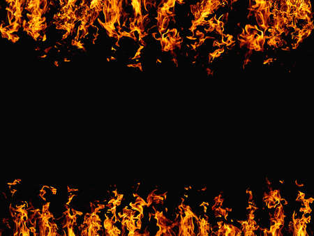 Flame background. Hot frame. Blaze heat. Bright orange yellow wildfire glow with spark texture isolated on black night abstract empty space banner.の写真素材