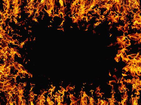 Fire background. Flame frame. Hell Inferno. Bright orange yellow hot blaze glow isolated on black night advertising banner with empty space for promotional text.の写真素材