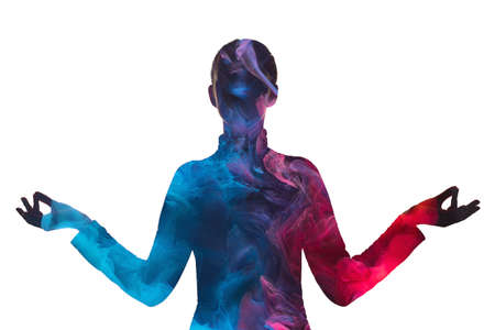 Double exposure silhouette. Inner peace. Harmony balance. Blue pink ethereal mist chakra in dark...