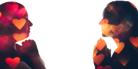 Lesbian love. Double exposure portrait. Lgbt pride. Gay romantic relationship. Neon red orange blur...