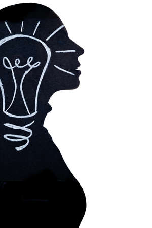 Innovative solution. Silhouette female portrait. Creative idea. Wisdom science. Enlightenment inspiration. Double exposure dark woman shape with light bulb draw isolated white.の写真素材