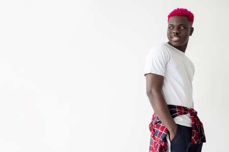 Stylish black man. Trend look. Fashion model shooting. Casual lookbook presentation. Smiling...