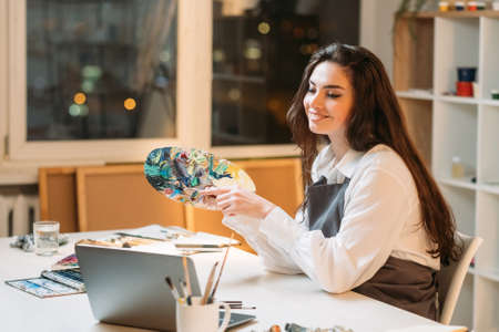 Online education. Female artist. Color array. Art school. Painting blog. Happy inspired woman...