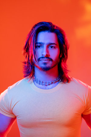 Macho man. Neon light portrait. Cyberpunk people. Masculine power. Confident sportive guy yellow...