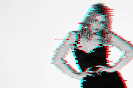 Futuristic woman. Party look. Model shooting. Sexy woman elegant dress posing isolated light black white photo red green pixel glitch effect defocused copy space.の写真素材