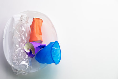 Food plastic. Debris waste. Litter reuse. Ecological problem. Used crushed trash collection isolated...