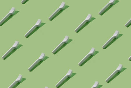 Tableware pattern background. Picnic forks. Ecology problem. Fast food littering. Collection of...