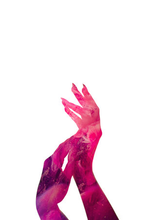 Hands art. Nail beauty salon. Female grace. Gentle touch. Creative double exposure of woman palms slender fingers with pink underwater ink texture isolated on white copy space.の写真素材