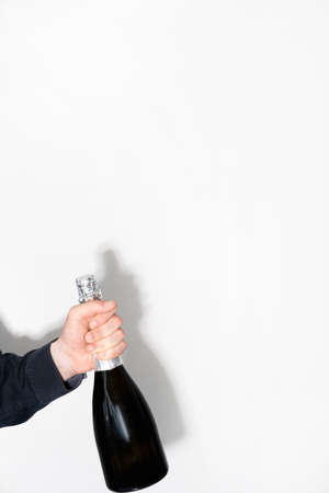 festive alcohol xmas drink man hand wine bottleの写真素材