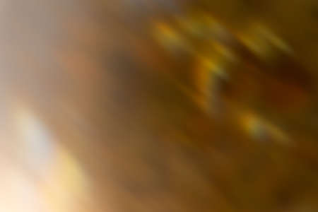 Blur glow background. Light flare. Sunlight radiance reflection. Bokeh beam. Defocused golden yellow...