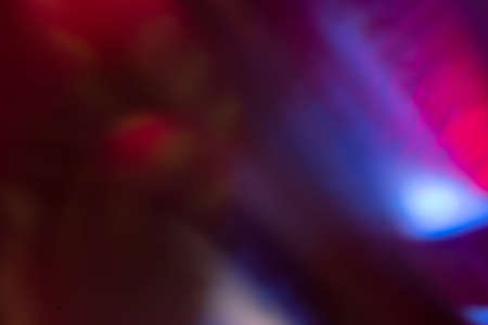 Lens flare overlay. Defocused glow. Bokeh ultraviolet disco light. Blur neon pink blue green color...